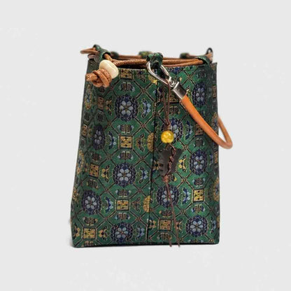 Imperial Treasures Songjin silk bucket bag - angled view showing drawstring closure